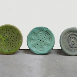 Bonnie Rychlak, "Morphed Florida Drains," 2012-13, hand carved cast wax, approx 4" x 22"