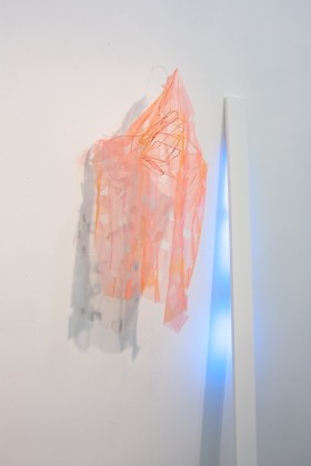 Vernacular Skins (Blue Light), 2021; Hardware mesh, wire, rubber, spray paint, fabric, thread, glue, polycrylic, LED light, wood, acrylic paint, plastic film; Dimensions variable