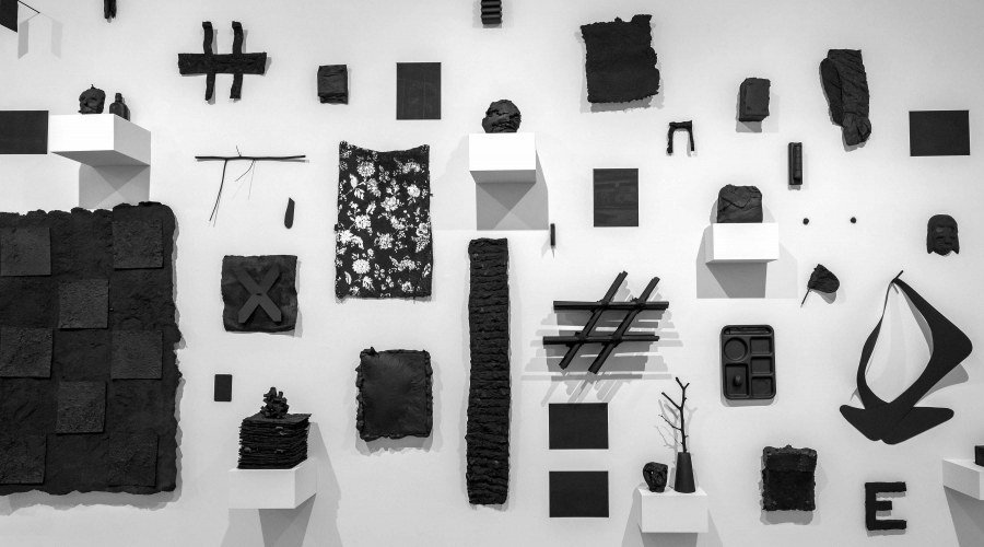 An exhibit where a bunch of everyday objects are painted black