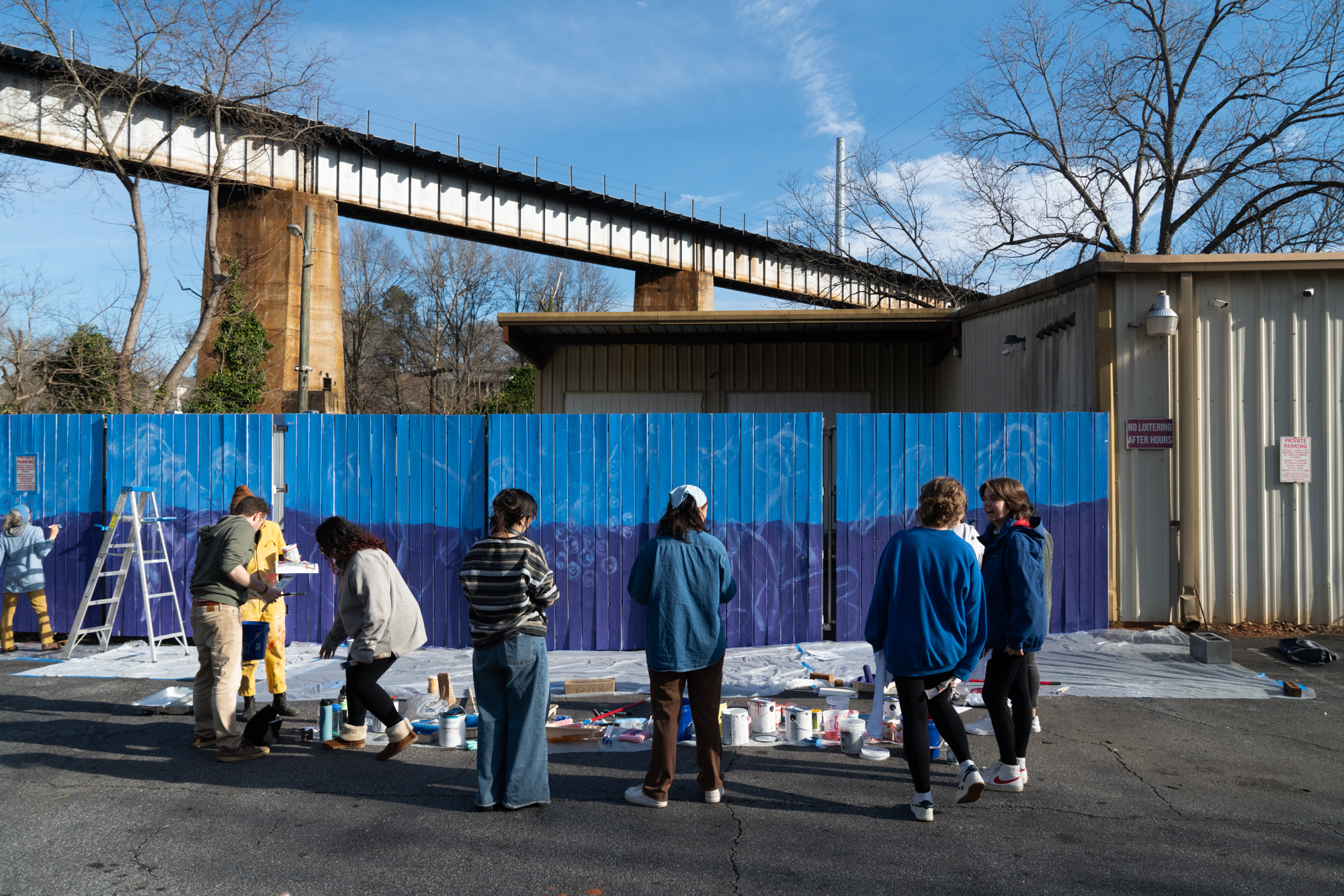 Photo: Volunteers preparing to paint exterior mural