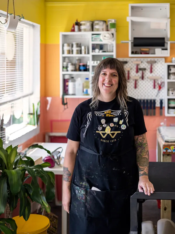 Amanda Burk, owner of Flat File Print Shop poses for a portrait at her studio on Friday, July 29, 2022 in Athens. Burk has been in the printmaking business for 20 years and opened Flat FIle Print Shop this past June. Kayla Renie, Athens-Banner Herald USA TODAY NETWORK