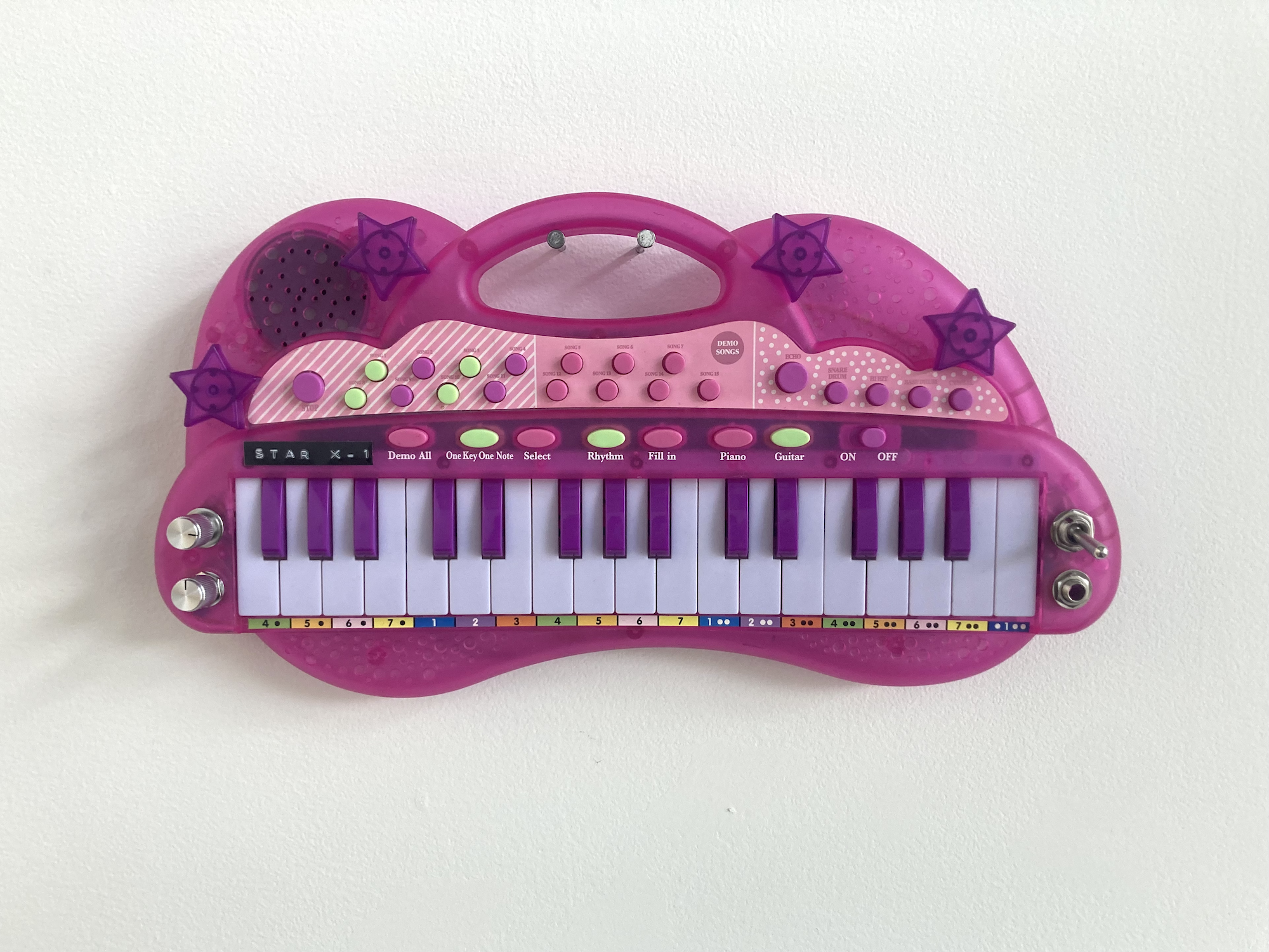 Alejandro Ramirez, Star X-1, 2023. Toy electronic piano, aluminum knobs, electronic components, 6" x 12" x 2"