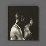 Cover image of I Can't Stand to See You Cry, photobook by Rahim Fortune, 2021. Black and white image of a person with braids and tank top holding a person from behind with earrings, necklace, and black and white polka-dot top.