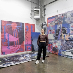 Image of Hong Hong standing in her studio. Beverly, MA. 2024. Photo by Mel Taing, courtesy of Boston Art Review.