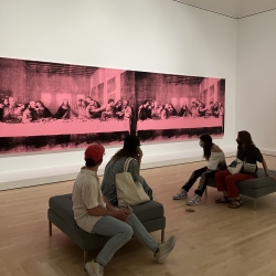 Students viewing Warhol piece in museum