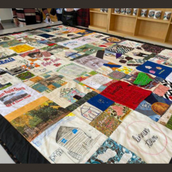 The completed quilt from the Linnentown Quilt Project lays on a table on April 10, 2022 at the Georgia Museum of Art in Athens, Georgia. The quilt features 86 squares and various materials. (Photo/Maddy Franklin)