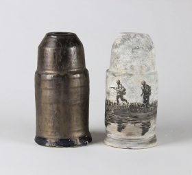 “Bullet Points: Vietnam War” 2021 8" x 3" x 12" Underglaze and glaze on stoneware