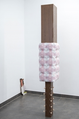 skins; 2023; MFC, wood, wood glue, fabric, wadding, yarn, metal o-rings, staples; 43 x 43 x 229 cm