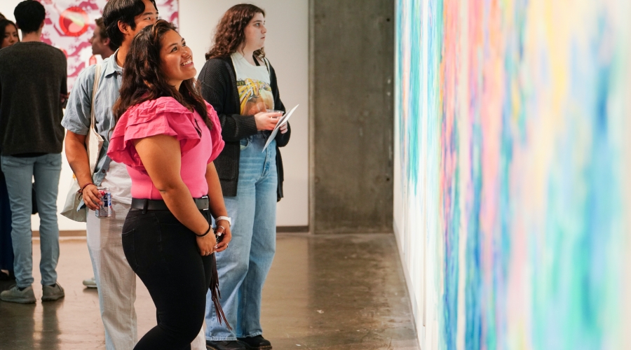 Students viewing artwork at the Lamar Dodd School of Art. Photo by Sidney Chansamone.