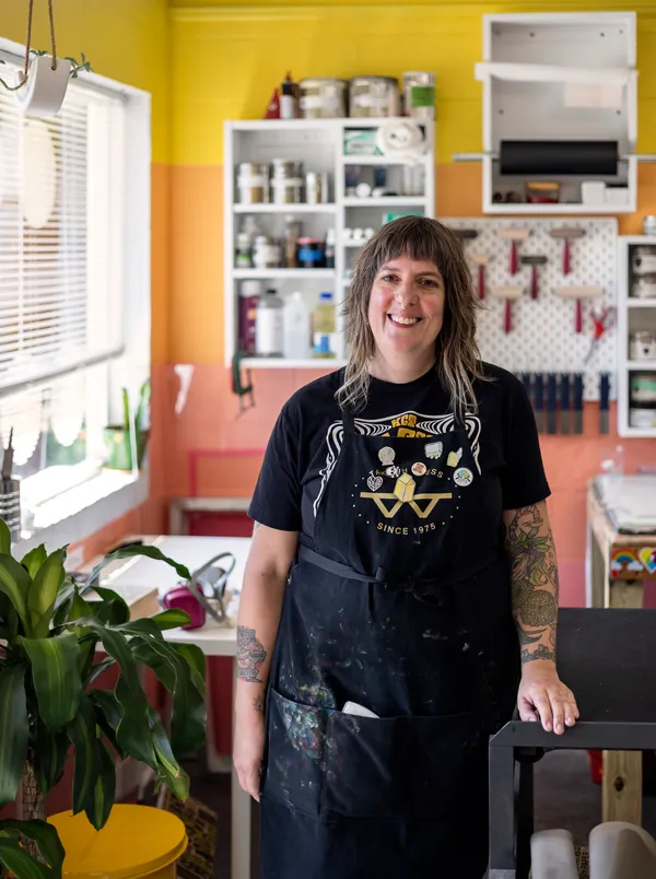 Amanda Burk, owner of Flat File Print Shop, poses for a portrait at her studio on Friday, July 29, 2022 in Athens. Burk has been in the printmaking business for 20 years and opened Flat FIle Print Shop this past June. Kayla Renie, Athens-Banner Herald USA TODAY NETWORK