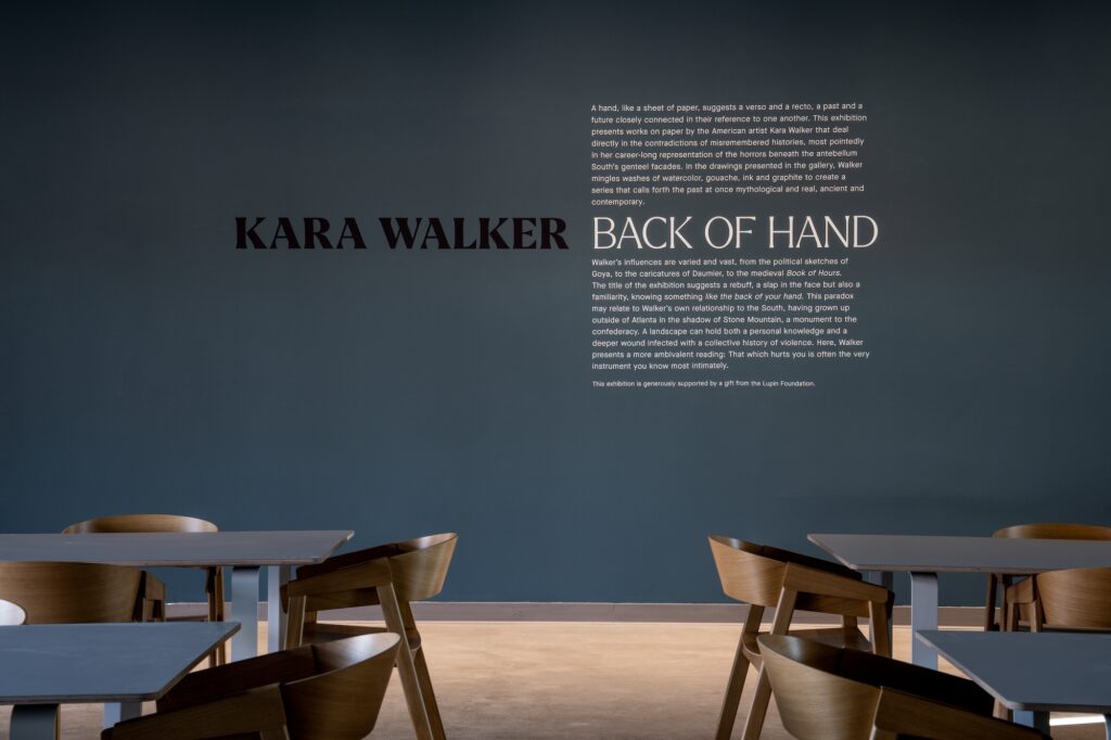 View of Kara Walker: Back of Hand exhibition wall text at the Athenaeum gallery.