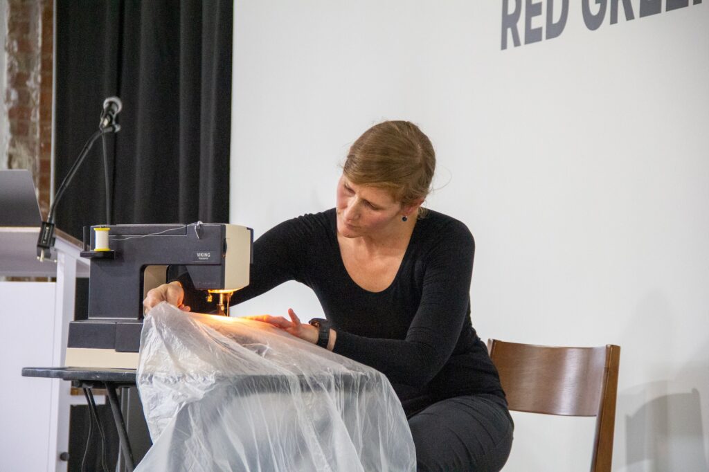 MFA Student Adah Bennion presents during the 4'33" Research Competition in the Arts at the 2023 Spotlight on the Arts Festival.