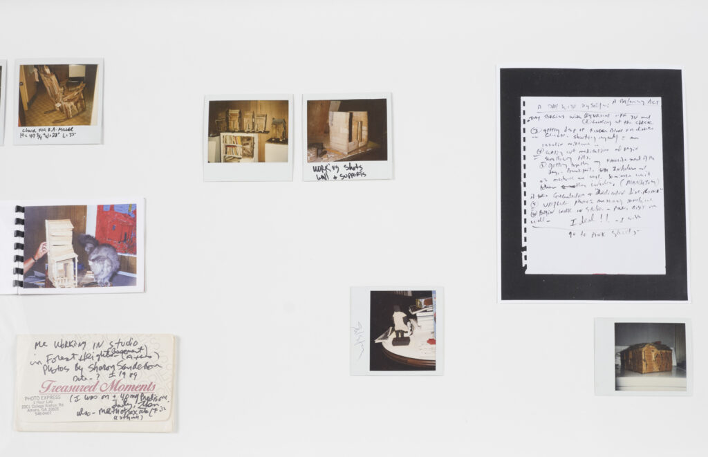 Installation view at the Athenaeum for “Beverly's Athens: Beverly Buchanan in Athens, GA”, Spring 2026. Assembled archival materials (polaroid photographs, handwritten notes, facsimiles) on white background. Photo courtesy of Walker Bankson.