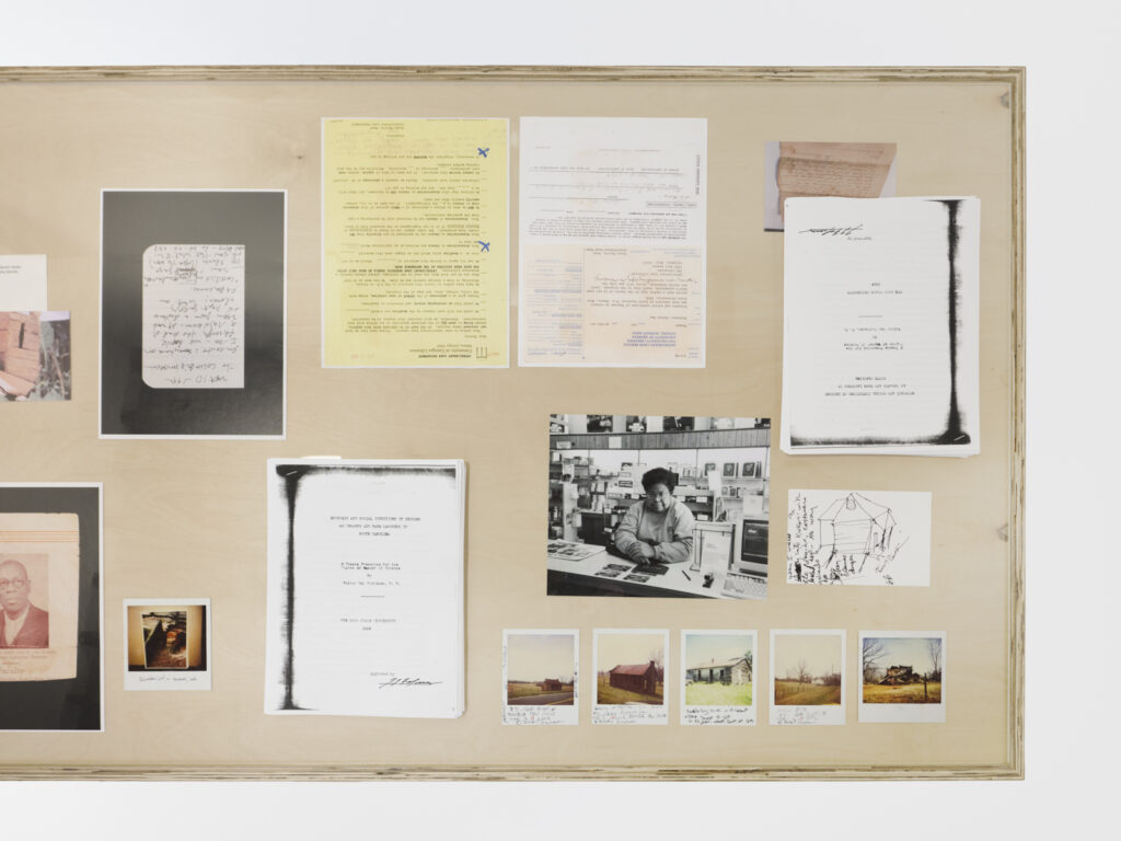 Installation view at the Athenaeum for “Beverly's Athens: Beverly Buchanan in Athens, GA”, Spring 2026. Assembled archival materials (polaroid photographs, handwritten notes, facsimiles) on wooden board. Photo courtesy of Walker Bankson.